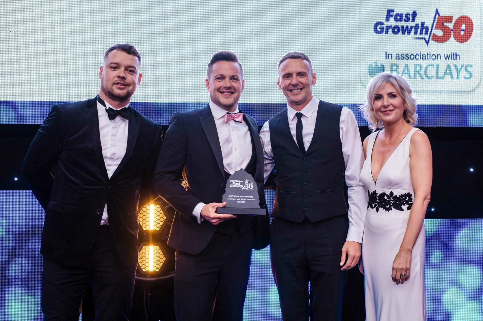 Phil Davies and Arron Davies accept the award for Fastest Growing Technology & Digital Business